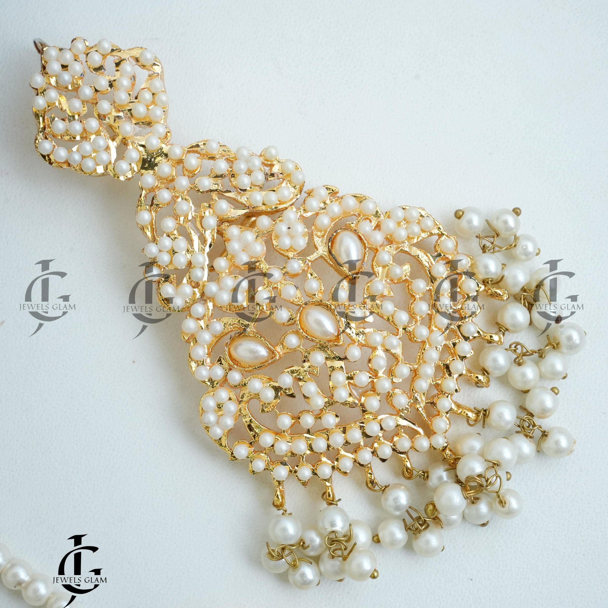 Pearl-Studded Bridal Earrings and Tikka Set