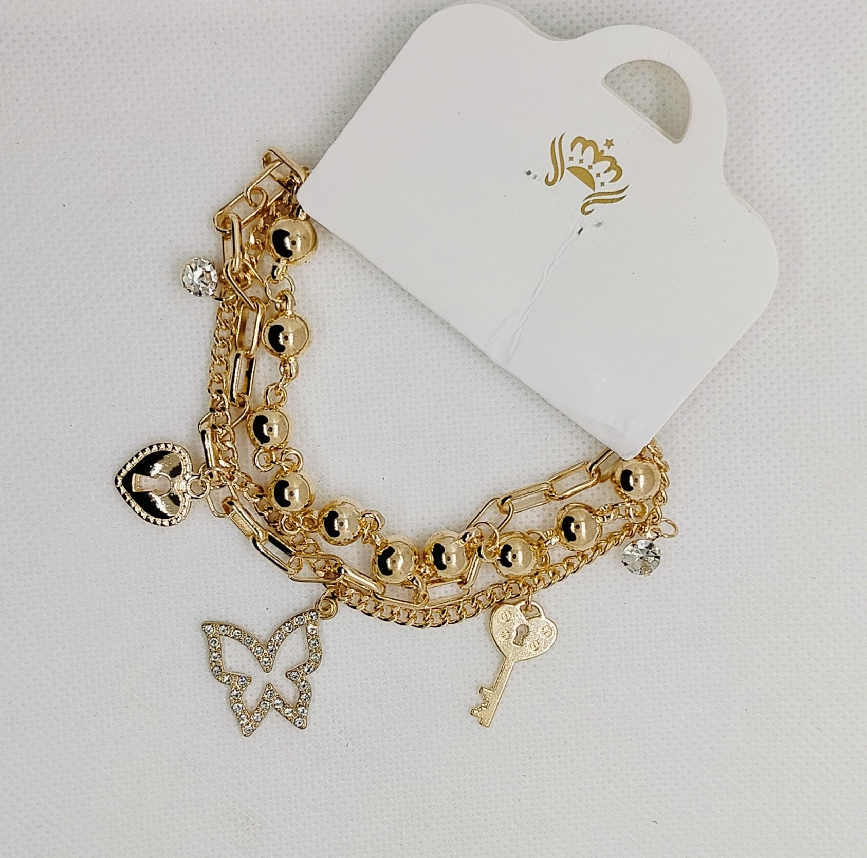 Elegant Charm Link Bracelet with Key and Heart Details