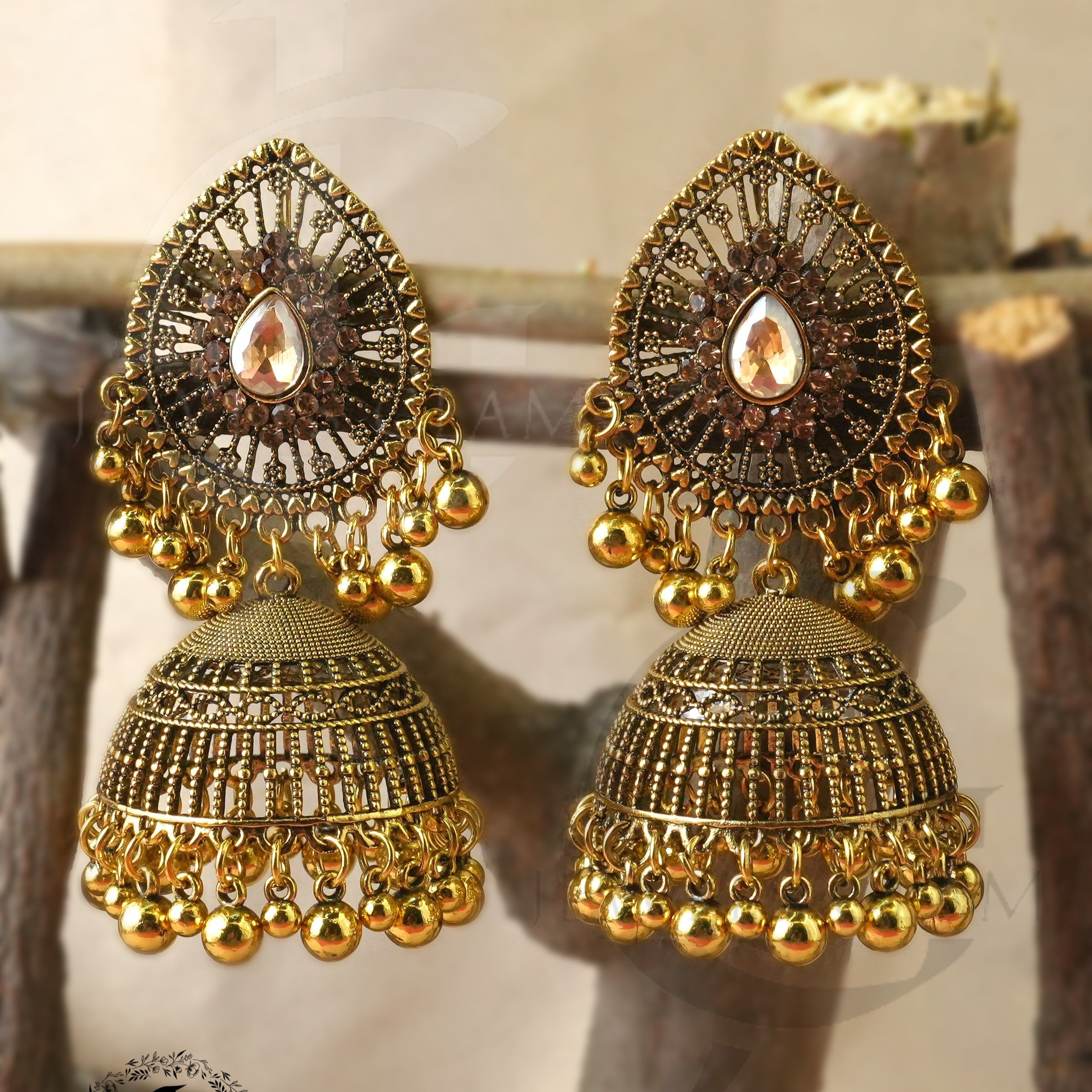Regal Gold-Plated Teardrop Jhumki Earrings
