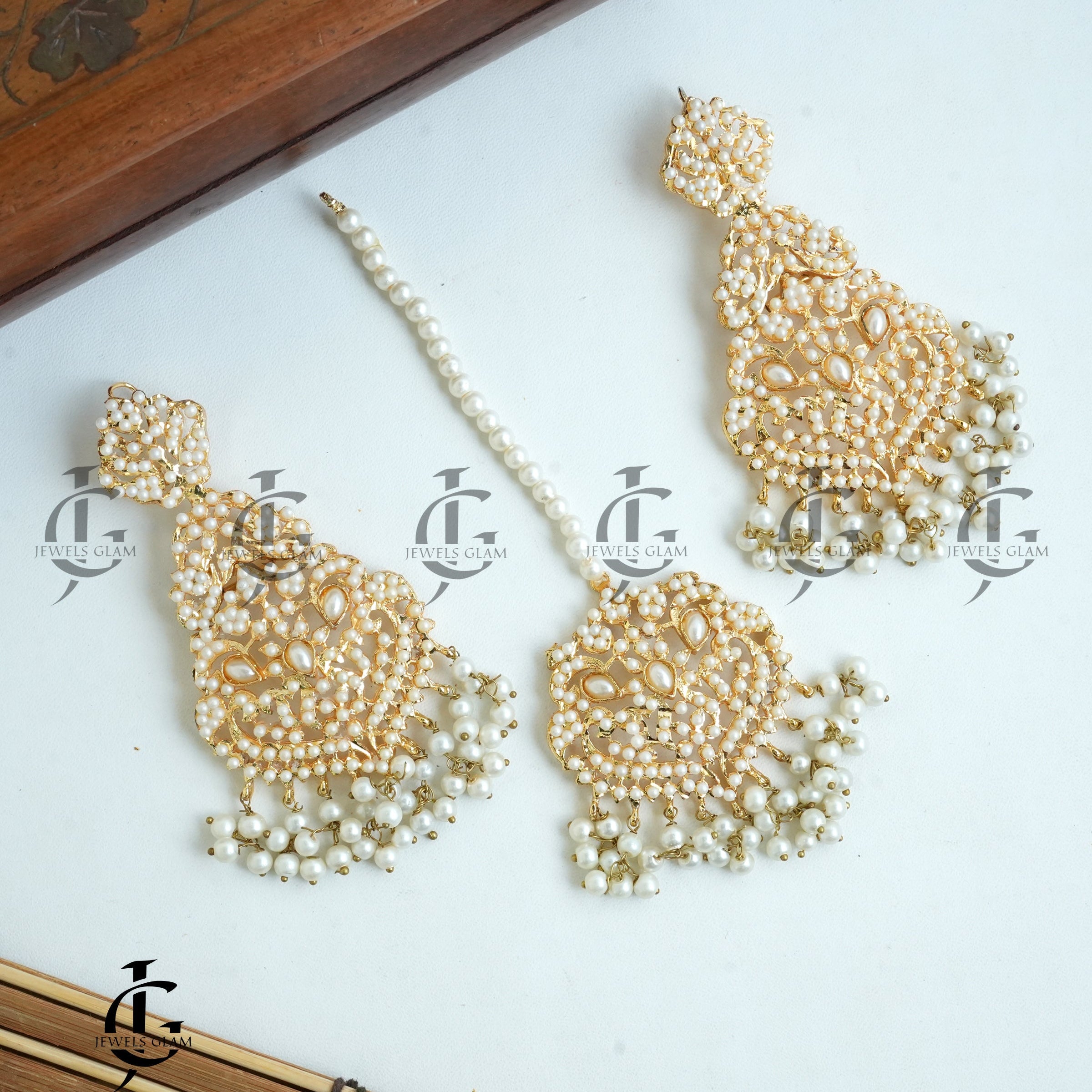 Pearl-Studded Bridal Earrings and Tikka Set