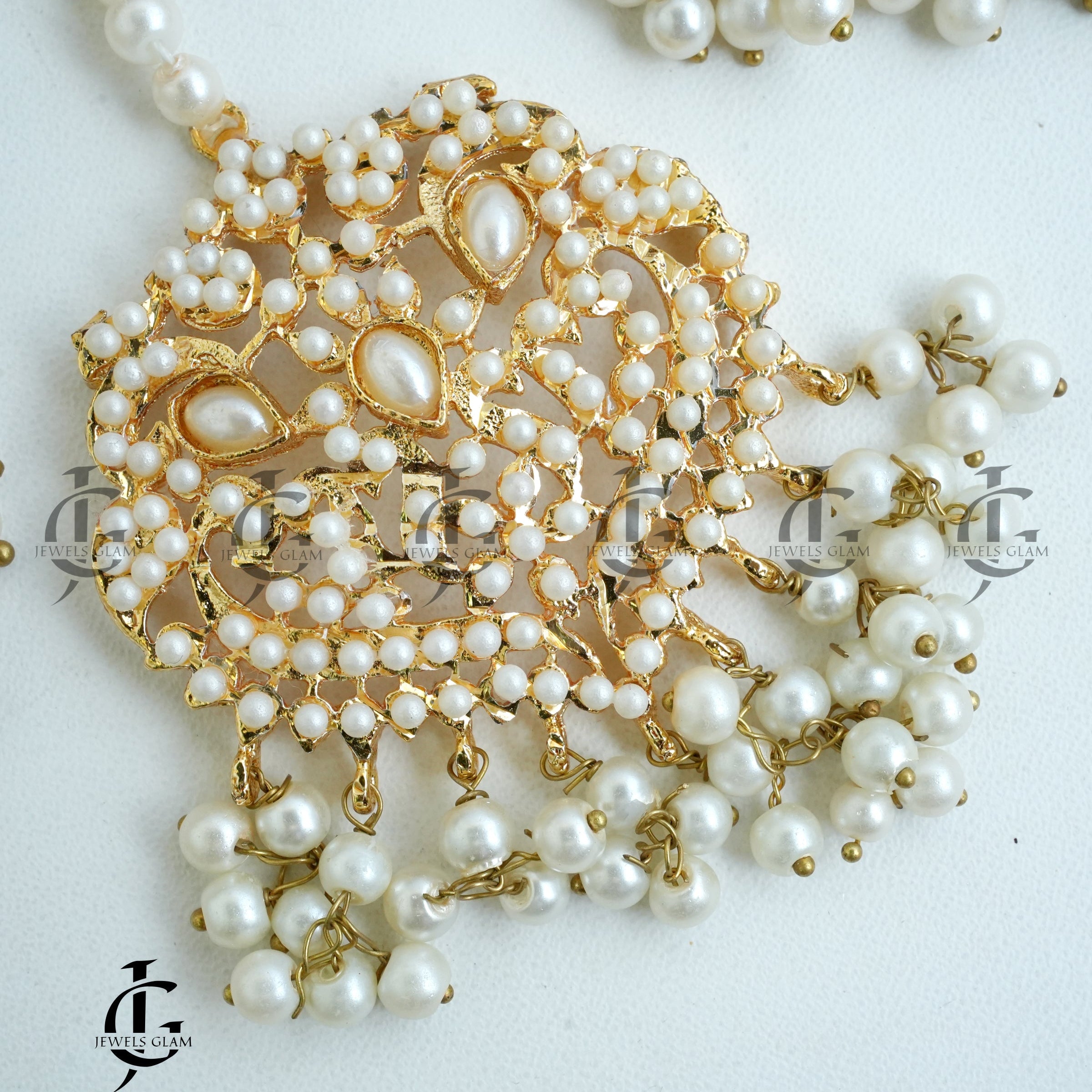 Pearl-Studded Bridal Earrings and Tikka Set